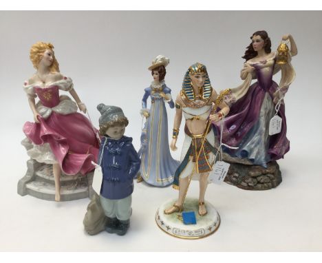 A Nao figurine of a boy; together with a Wedgwood figure of Tutankhamun and three figurines of ladies (5) 