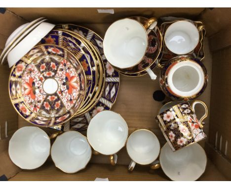 A large collection of Royal Crown Derby Imari porcelain, to include cups, saucers, coffee cans and pin trays