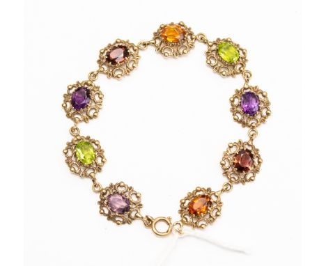 A 9ct gold semi precious stone set bracelet to include peridot, amethyst, garnet and citrine a/f chipped citrine, claw set wi