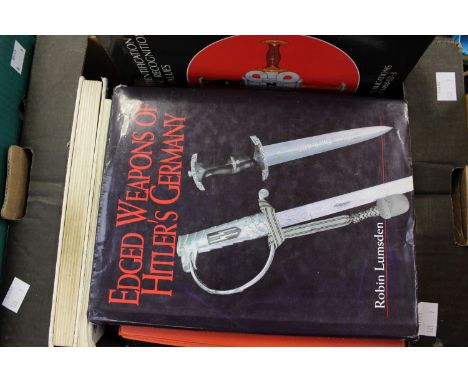 A collection of nine Third Reich militaria collectors reference books. Includes some old out of print books such as "Third Re