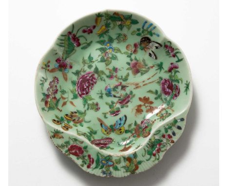 A CHINESE FAMILLE ROSE LOBED DISH, QIND DYNASTY, LATE 19TH CENTURY The lobed shell-shaped dish vividly enamelled with butterf