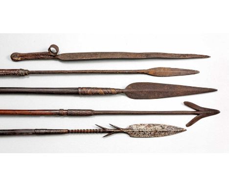 A COLLECTION OF WEAPONS FROM VARIOUS NORTH NGUNI AND NGONI REGIONS Metal arrow shaped spear heads two with barbs, attached to