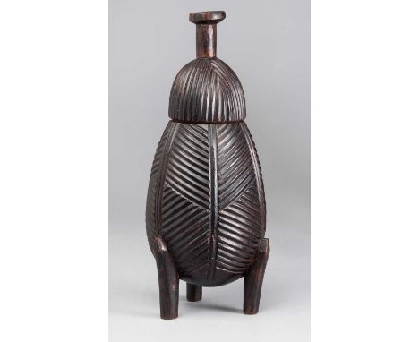 A ZULU GROOVED VESSEL WITH LID, 19thCENTURY Cylindrical shaped vessel swelling in the middle, with lid standing on three legs