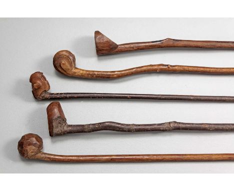 COLLECTION OF CLUBS WITH ASYMMETRICAL HEADS, FROM SWAZILAND Sticks with asymmetrical knobs, Swazi. Three with grooved knobs (