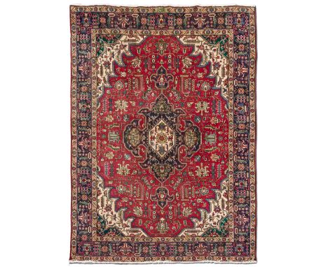A TABRIZ CARPET, IRAN, MODERN 331 by 240cm 