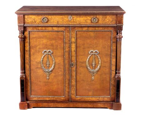 A VICTORIAN WALNUT AND GILT- METAL MOUNTED CABINET The rectangular top above a long frieze drawer, a pair of panelled doors b