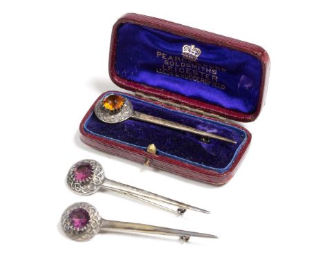 THREE 1950'S SCOTTISH SILVER CELTIC BROOCHES with inset coloured stones by Robert Allison, with marks for Glasgow 1952, each 