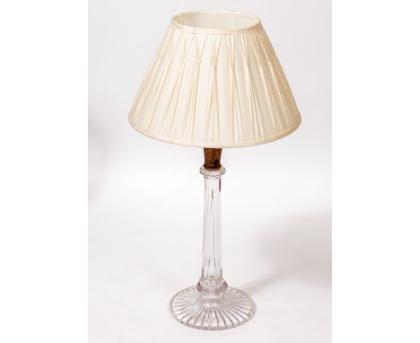 A TABLE LAMP  with a glass base, the base 53cm high