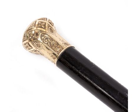 A VICTORIAN WALKING CANE with chased and engraved gilt metal finial, an inscription dated 25th December 1886, on an ebonised 