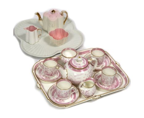 A GRAINGER'S WORCESTER PORCELAIN TEASET  with tray, four cups and saucers, sugar bowl, milk jug and teapot, the tray 40cm wid