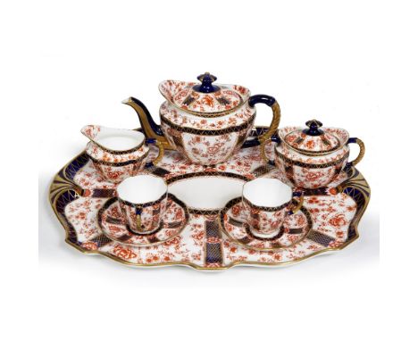 A ROYAL CROWN DERBY DUET TEASET in the Chatsworth pattern, consisting of a tray, a teapot, sugar basin and cover, milk jug an