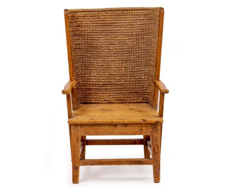 AN EARLY 20TH CENTURY PINE AND WICKER ORKNEY CHAIR with arching back, scrolling arms and solid seat, and bearing an enamel Li