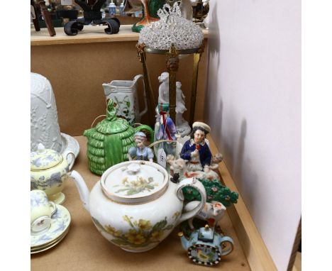A Royal Doulton figure, Sweet Anne, HN1318, Staffordshire figures, teapots, and a lamp 