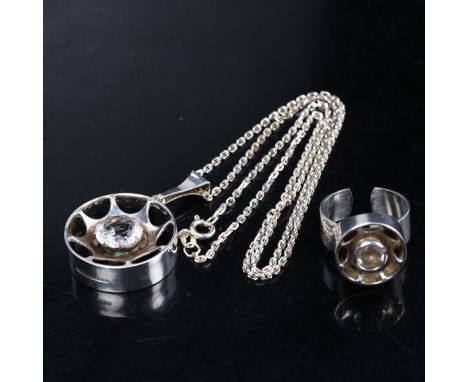 A Vintage Finnish sterling silver cubic zirconia pendant, and matching ring (2) 