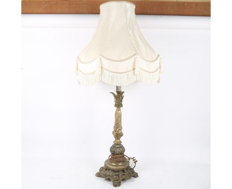 An Antique brass table lamp and shade, overall height 90cm