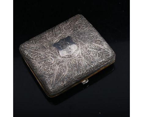 An Eastern unmarked white metal curved cigarette case, embossed and engraved decoration with gilt interior, 8.5cm x 7.5cm 