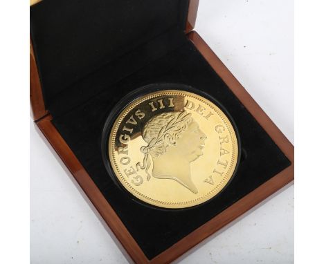 A London Mint Office First Ever Military Guinea Golden Commemorative coin, limited edition of 1,813, diameter 19cm, cased, wi