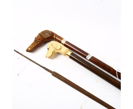 2 novelty dog-head walking sticks, and an African spearhead, length 106cm (3) 
