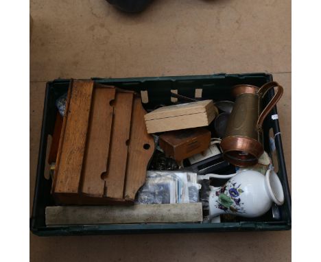 A large quantity of various collectables, including loose postcards, military cap badges, Art Deco slate dome-top mantel cloc