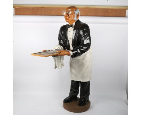 A Vintage hand painted composition figural dumb waiter, height 94cm 
