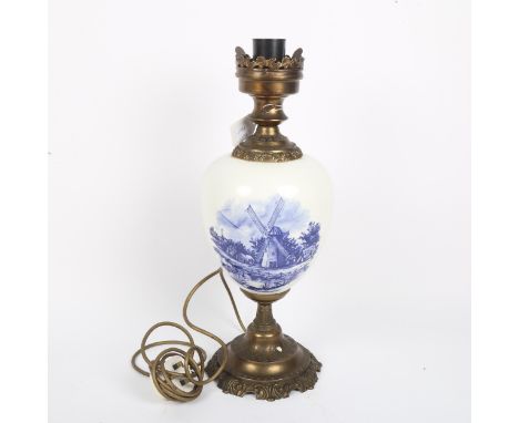 Blue and white transfer decorated brass urn table lamp, height 44cm 