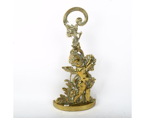 Vintage brass cherub doorstop, height 48cm, and a gilt-brass furniture mount with Victorian lozenge mark 
