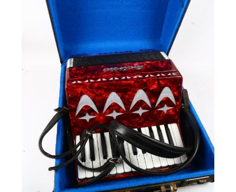 A Galotta piano accordion, width 32cm, in case 