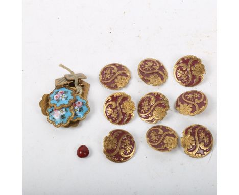 A group of hand painted and enamel brass buttons 