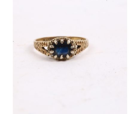 A late 20th century 9ct gold sapphire ring 