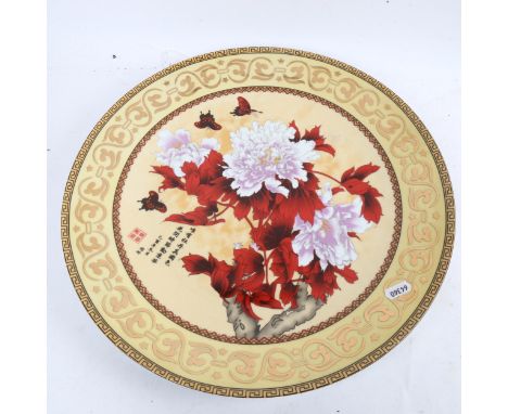 A Chinese glazed ceramic charger, with floral decoration, W41cm 