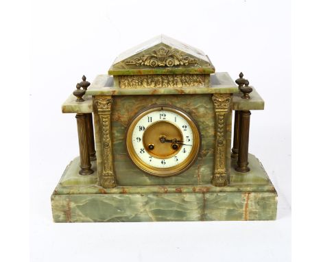 An early 20th century green onyx architectural 8-day mantel clock, case height 28cm, with pendulum and key 
