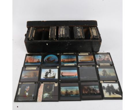 A case of various 19th century Magic Lantern slides, including religious, warships etc 