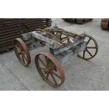Set of four matching cast wheels on axles. Suit shepherds hut.