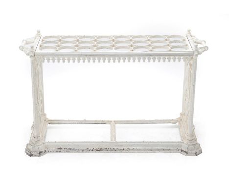 A Victorian Style Cast Metal and Painted Stick Stand, the rectangular top with twenty-four circular apertures to receive stic