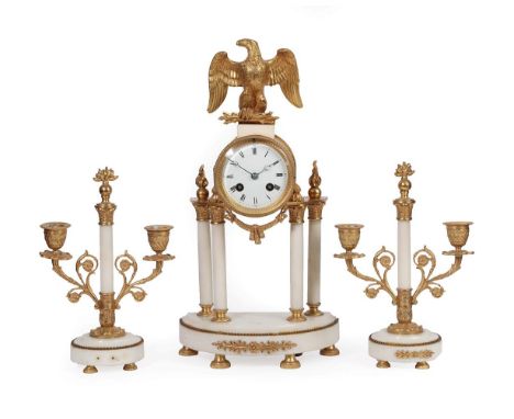 A White Marble and Gilt Metal Mounted Striking Portico Mantel Clock Garniture, early 20th century, case surmounted by an eagl