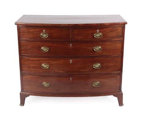 A George III Mahogany Bowfront Chest of Drawers, late 18th century, the two short over three long graduated drawers, with ivo