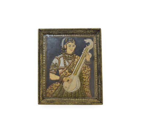 Indian School (19th century) Half-length portrait of a youth playing a sitar Watercolour and relief work, 29cm by 23cm