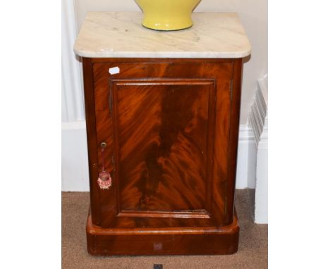 A Victorian Mahogany Pot Cupboard, 3rd quarter 19th century, the grey and white marble Carrera top above a moulded cupboard d