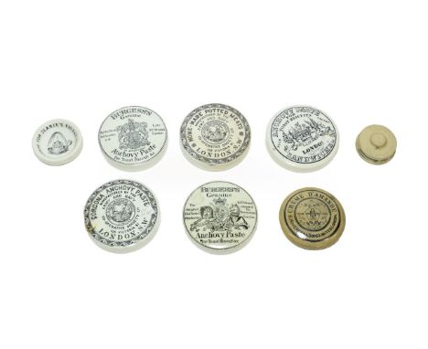 A Collection of Six Anchovy Paste and Other Pot Lids, 19th century; A Stoneware Eye Ointment Pot; and A Night Light Holder (q