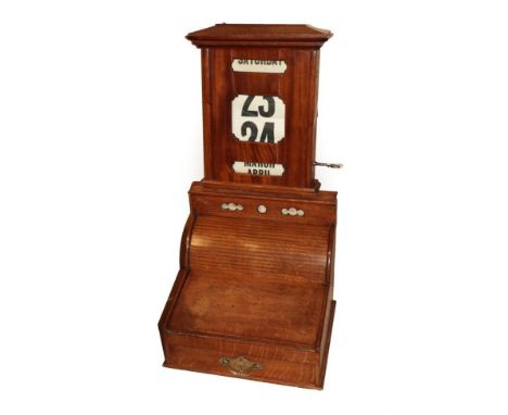 A Mahogany Cased Perpetual Wall Calendar, the caddy top over a cavetto frieze and day, date and month apertures with paper sc