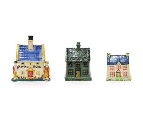 A Yorkshire Prattware Money Box, circa 1810, modelled as a cottage, inscribed SAVING BANK flanked by two figures, 14.5cm high
