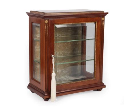 A Late Victorian Gilt Metal Mounted Mahogany Table Display Cabinet, with caddy top over single glazed door flanked by fluted 