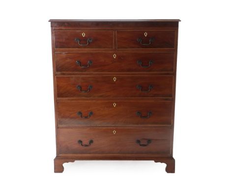 A Late George III Mahogany Straight Front Chest, early 19th century, the moulded top above two short and five graduated drawe