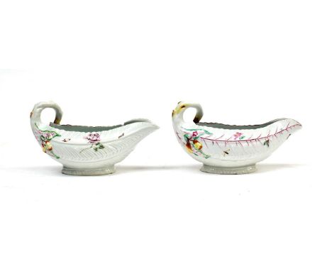 A Worcester Porcelain Cos Lettuce Leaf Sauceboat, circa 1755, painted in colours with scattered flowersprays and insects, 19c