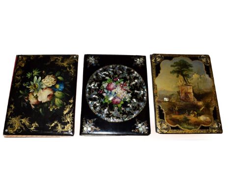 Three Victorian Papier Mâché Desk Blotters, 19th century, each of rectangular form, two painted with flowers, one heightened 