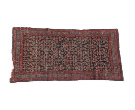 Malayir Khelleh West Iran, circa 1970 The deep indigo Herati field enclosed by pale indigo borders of stylised flowerheads an