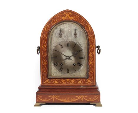 A Mahogany Inlaid Quarter Striking Table Clock, circa 1890, arch pediment, side carrying handles, bracket feet, arch silvered