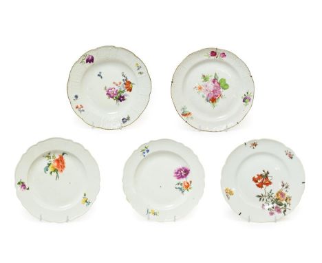A Russian Imperial Porcelain Factory Dessert Plate, 1762-1796, painted with a flowerspray and scattered sprigs within an ozie