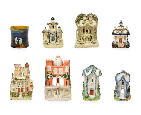 A Pottery Model of a Cottage, attributed to the Don Pottery, circa 1820, as a two storey building amongst trees, on a mound b