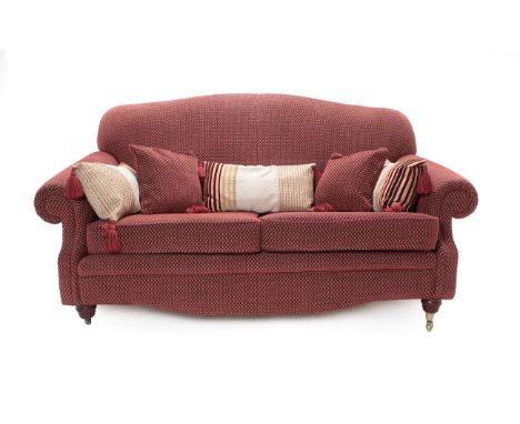 A Victorian Style Two-Seater Sofa, modern, covered in red and gold patterned fabric, with five scatter cushions, rounded arm 